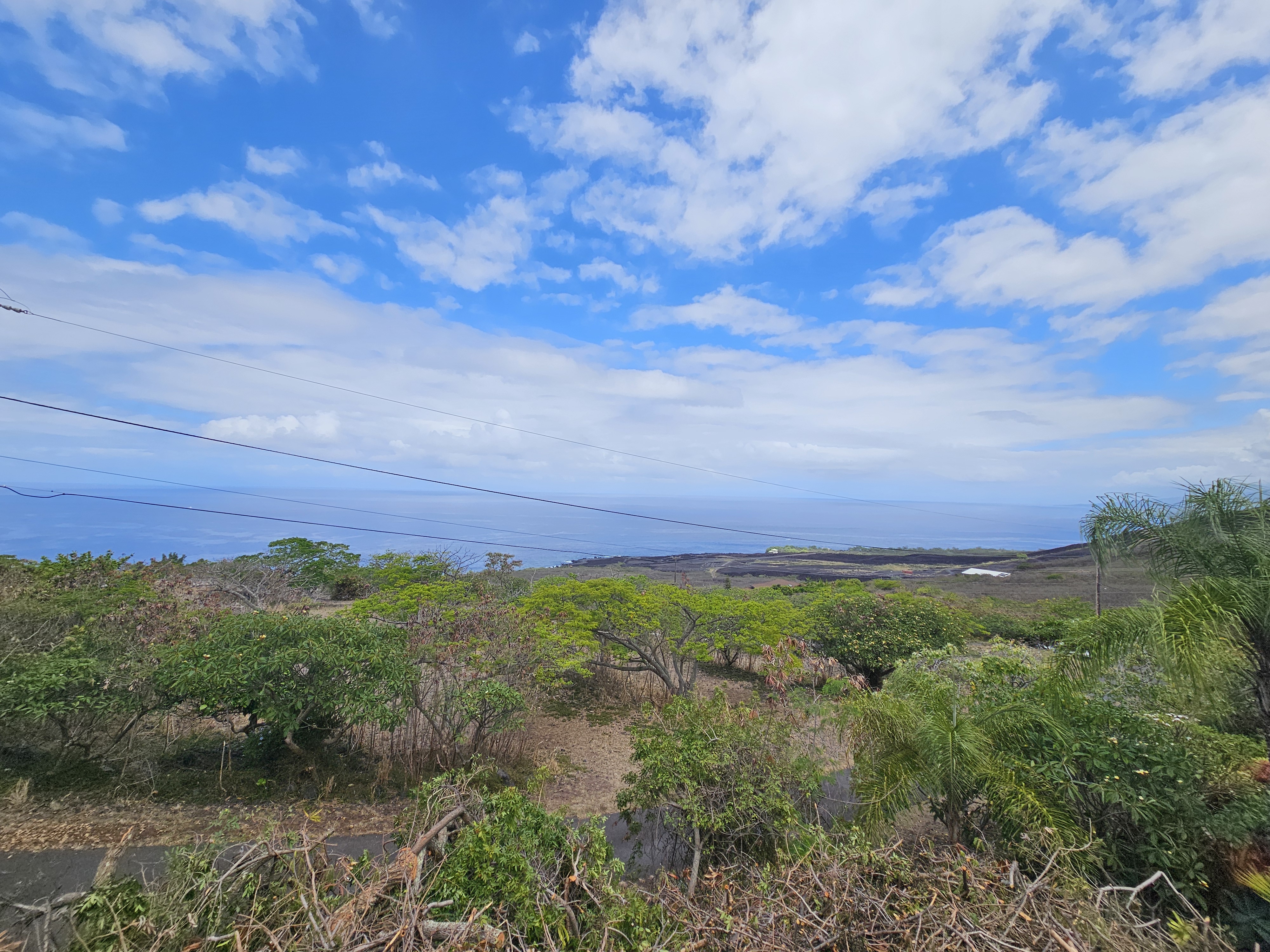 204 Road H Captain Cook Hi 96704 Captain Cook, HI 96704 - Photo 11 of 20 a view of a field with an ocean