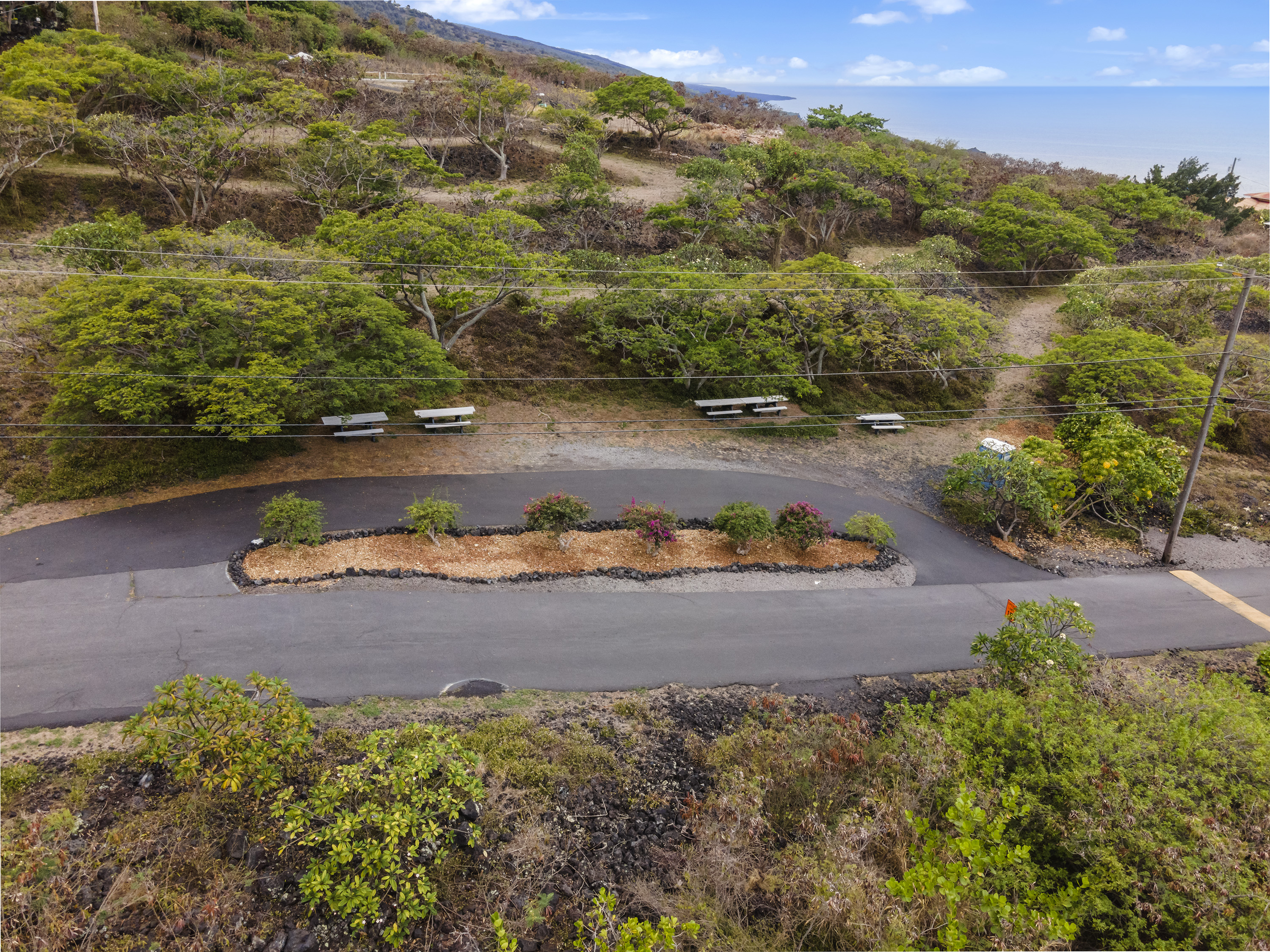 204 Road H Captain Cook Hi 96704 Captain Cook, HI 96704 - Photo 18 of 20 an aerial view of a house with a yard and lake view