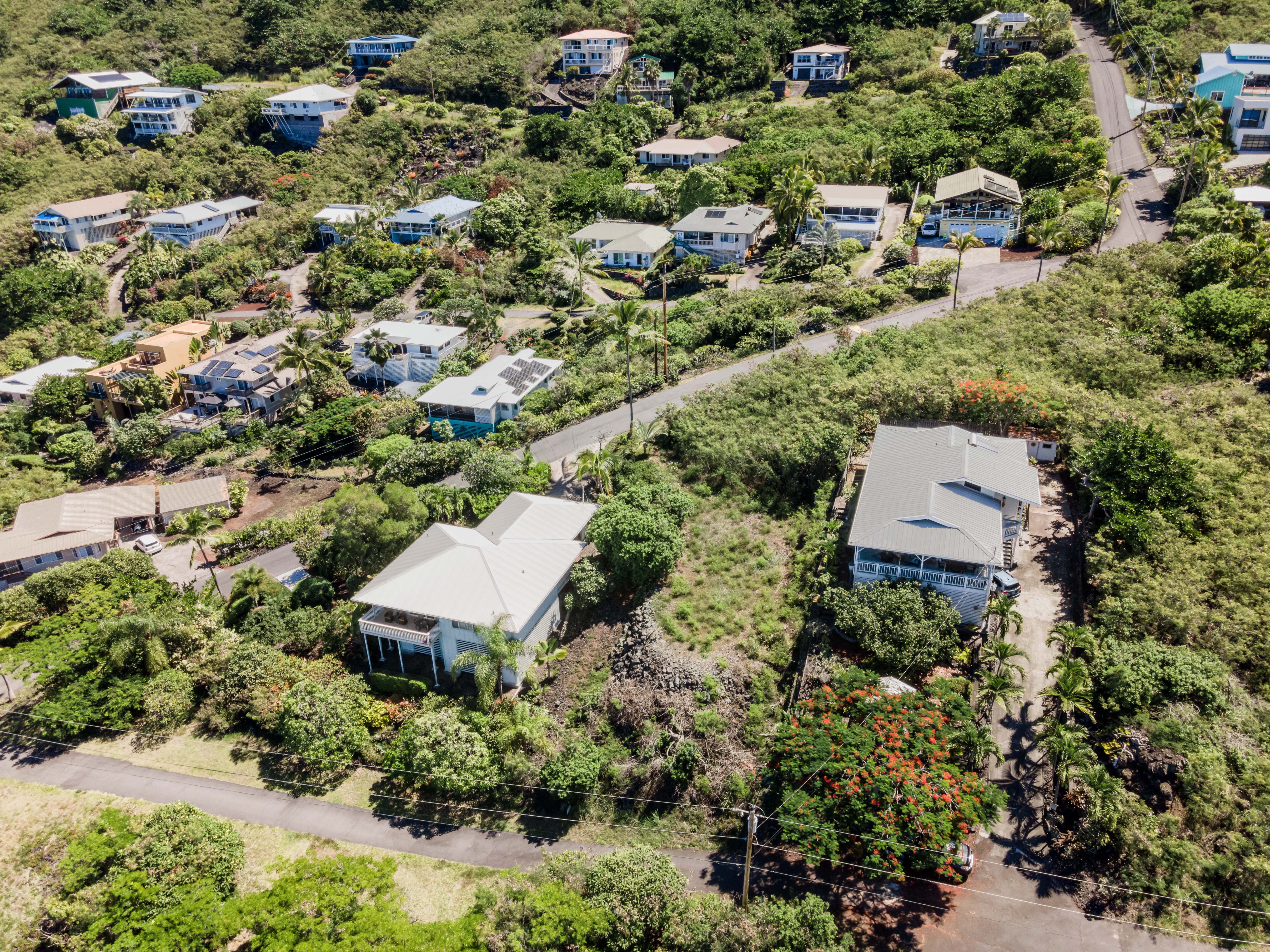 204 Road H Captain Cook Hi 96704 Captain Cook, HI 96704 - Photo 4 of 20 an aerial view of a house with a yard and outdoor seating