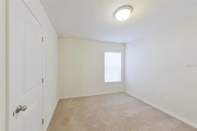 a view of empty room with window