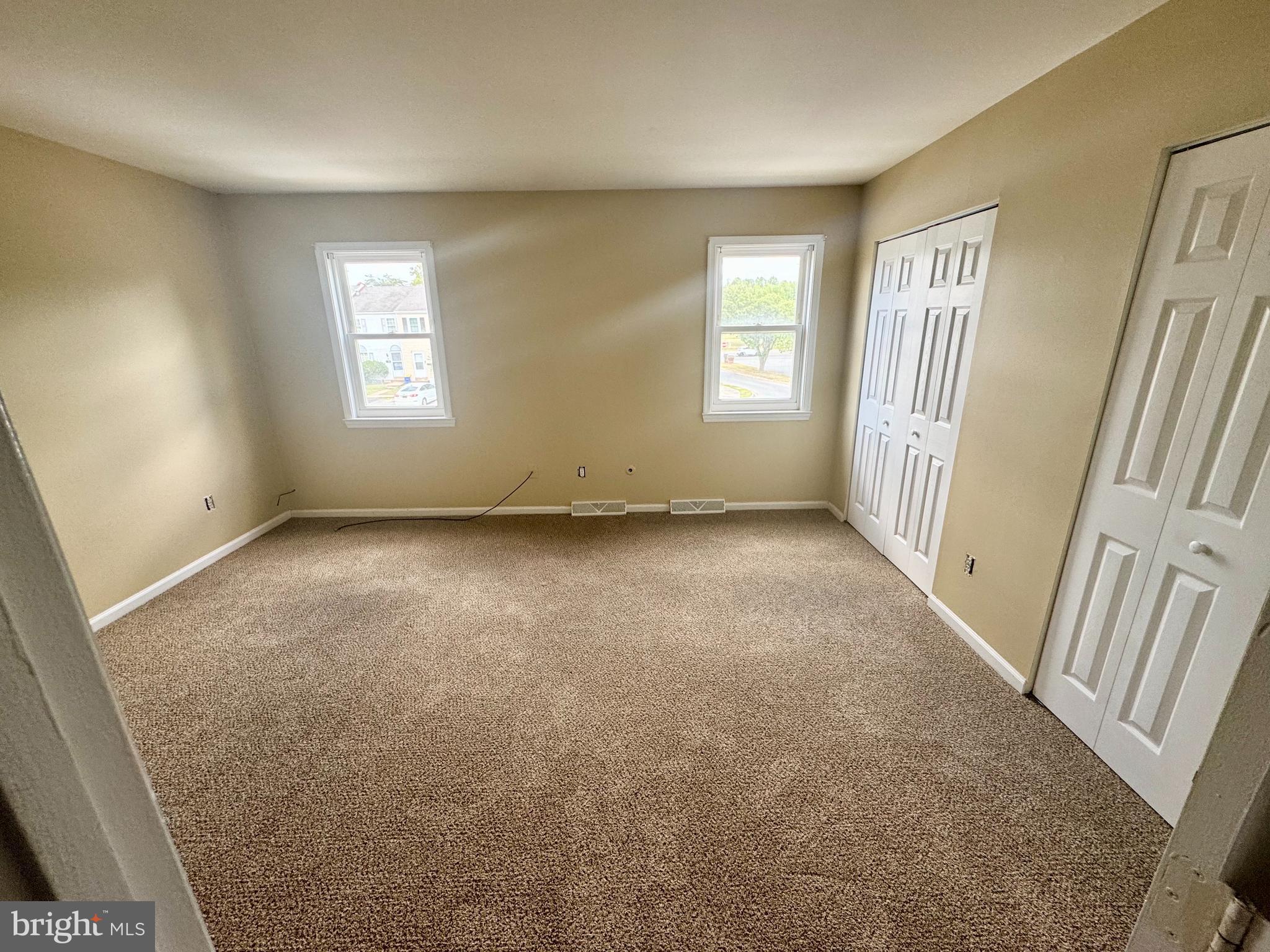 8 Forest Creek Drive Dover, DE 19904 - Photo 2 of 8 an empty room with windows