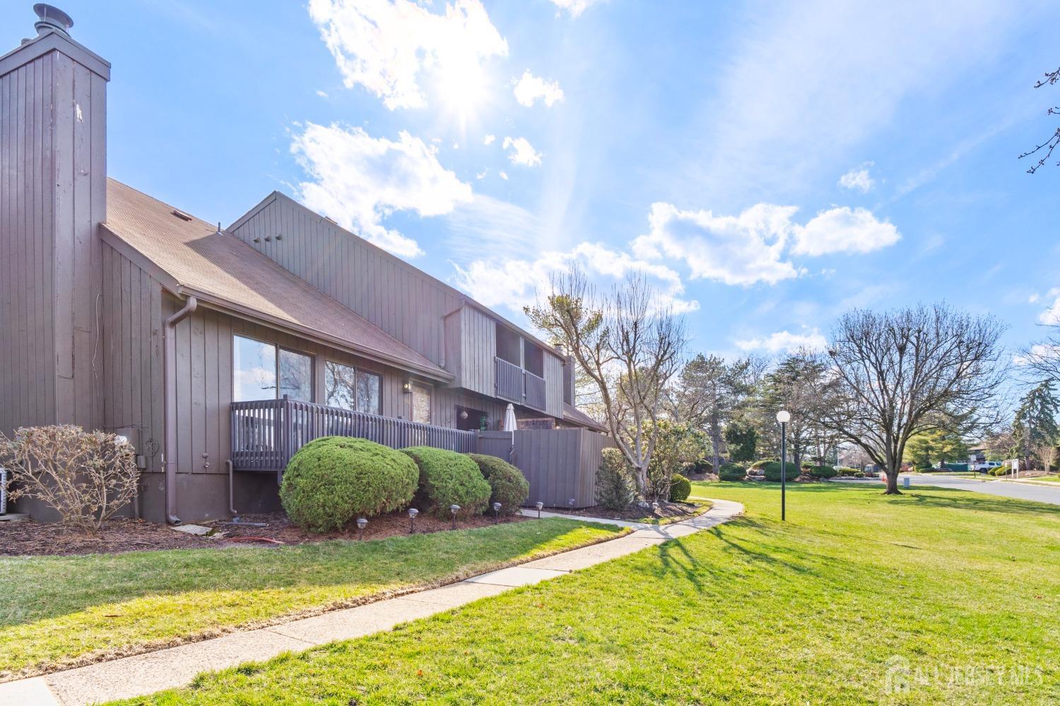 100 Westgate Drive Edison, NJ 08820 - Photo 2 of 5 a view of a house with a big yard