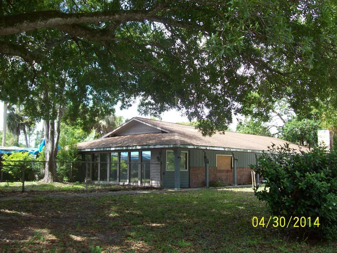 7403 Pensacola Road Fort Pierce, FL 34951 - Photo 2 of 4 Left Side