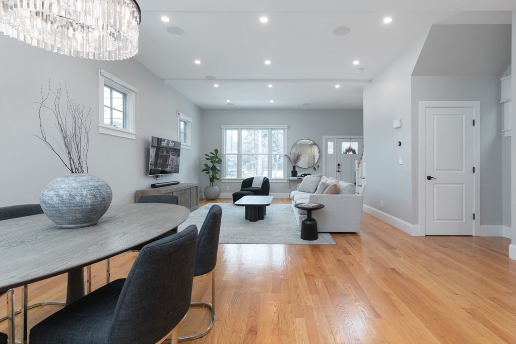 260 Amory Street Boston, MA 02130 - Photo 6 of 20 a living room with furniture and a chandelier