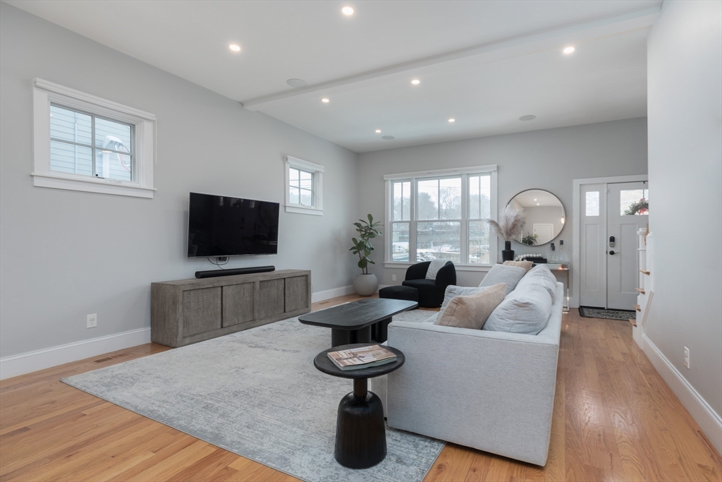 260 Amory Street Boston, MA 02130 - Photo 7 of 20 a living room with furniture and a flat screen tv