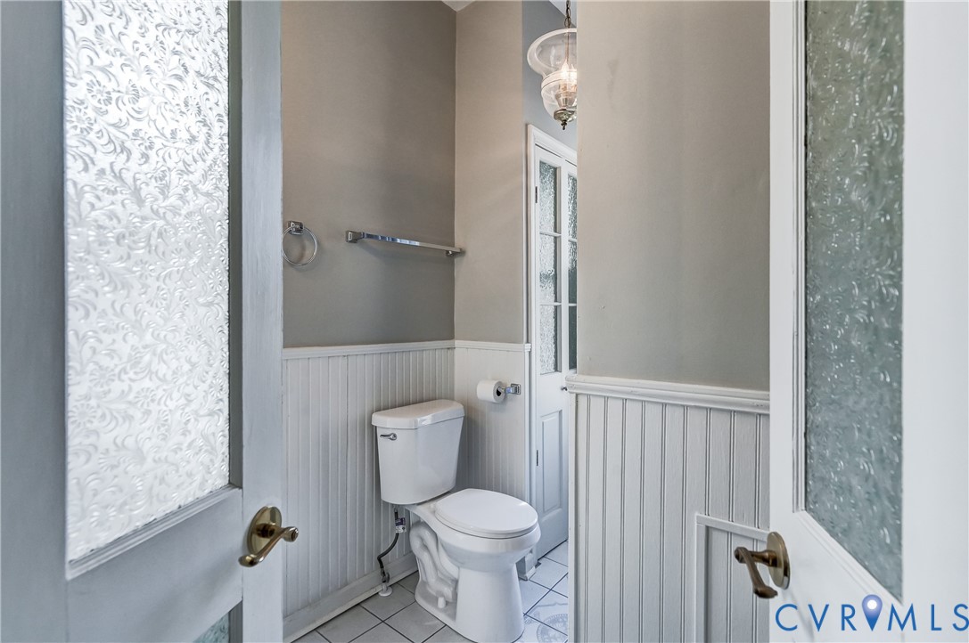 418 4th Street West Point, VA 23181 - Photo 26 of 36 a bathroom with a toilet and a shower