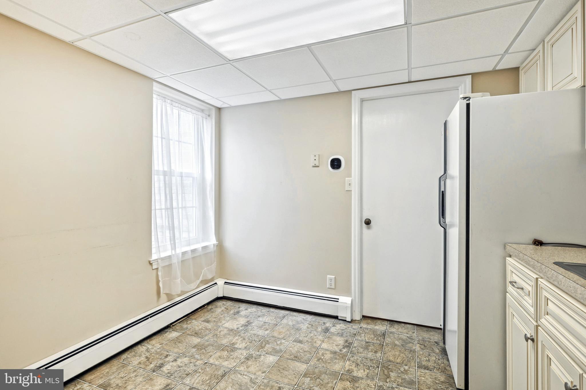 1000 Country Club Road, Unit 13 York, PA 17403 - Photo 13 of 24 Room for a table - vinyl floor