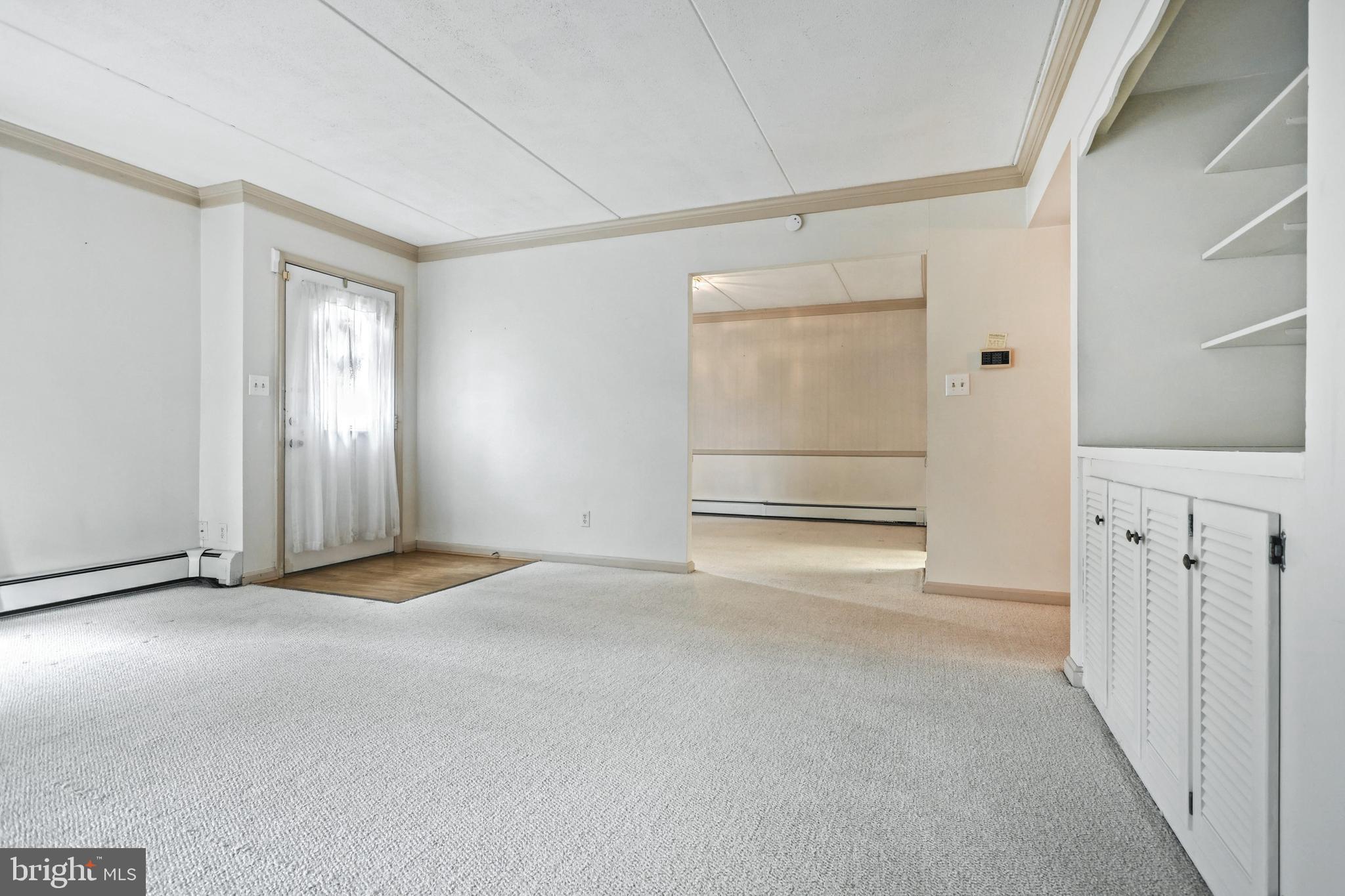 1000 Country Club Road, Unit 13 York, PA 17403 - Photo 8 of 24 Living Room Flows into Dining Room