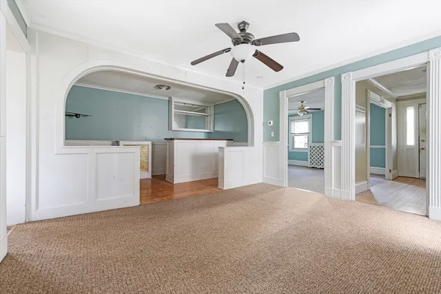 a view of a kitchen with a sink and cabinet