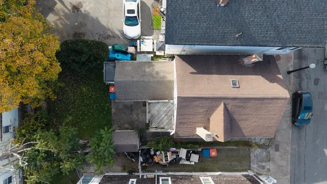 an aerial view of houses with outdoor space