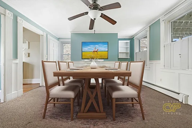 a view of a dining room with furniture