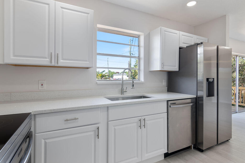 1978 Northeast Ridge Avenue Jensen Beach, FL 34957 - Photo 3 of 39 IMG_0045