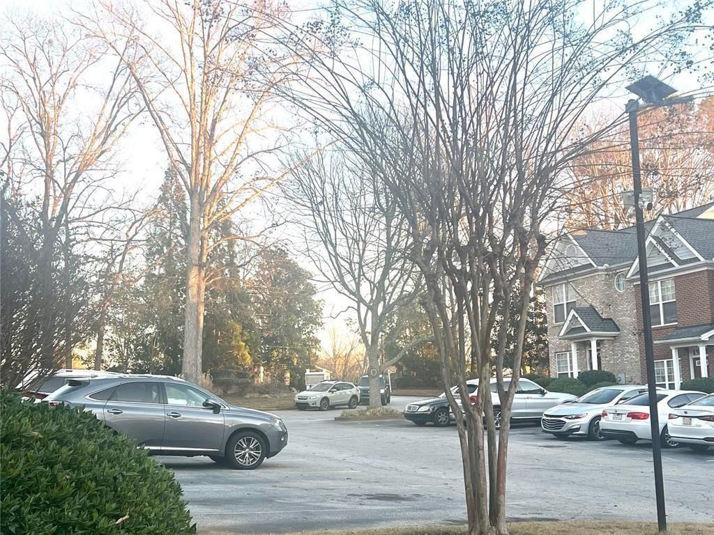 3854 Austin Park Lane Decatur, GA 30032 - Photo 41 of 44 a street view with cars parked on the road