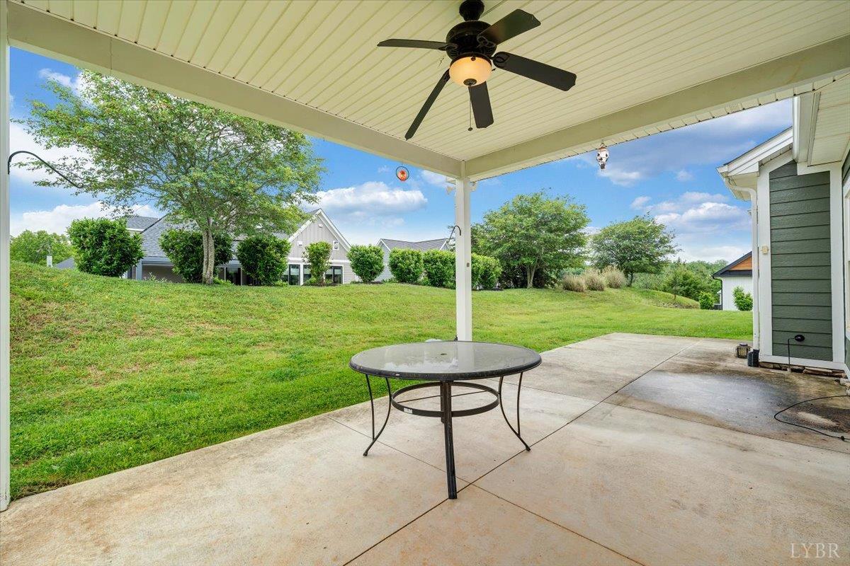 1250 Our Cove Road Huddleston, VA 24104 - Photo 44 of 70 a view of a backyard with a garden and entertaining space