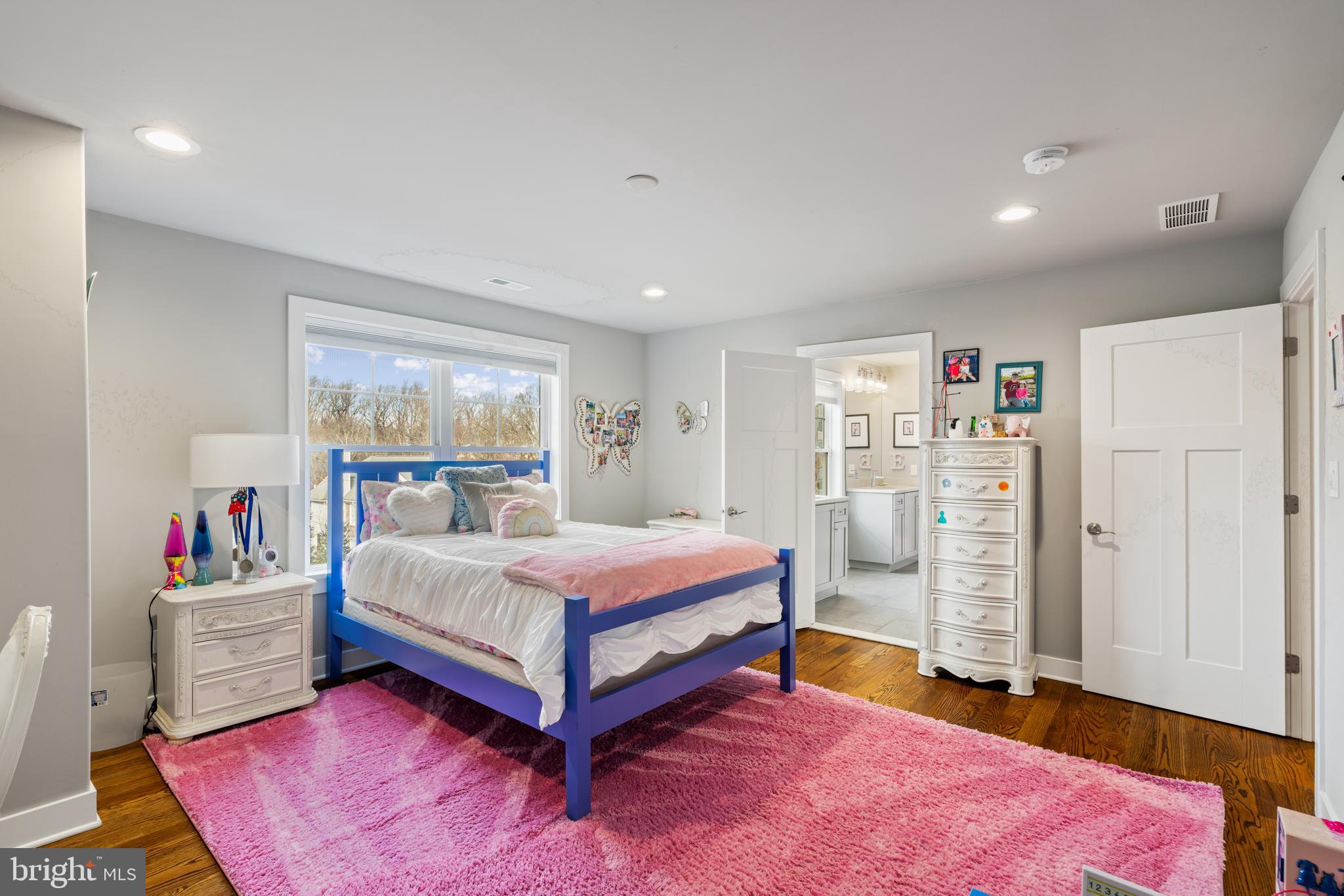 601 Spruce Lane Villanova, PA 19085 - Photo 15 of 27 a bedroom with a bed and a cabinets