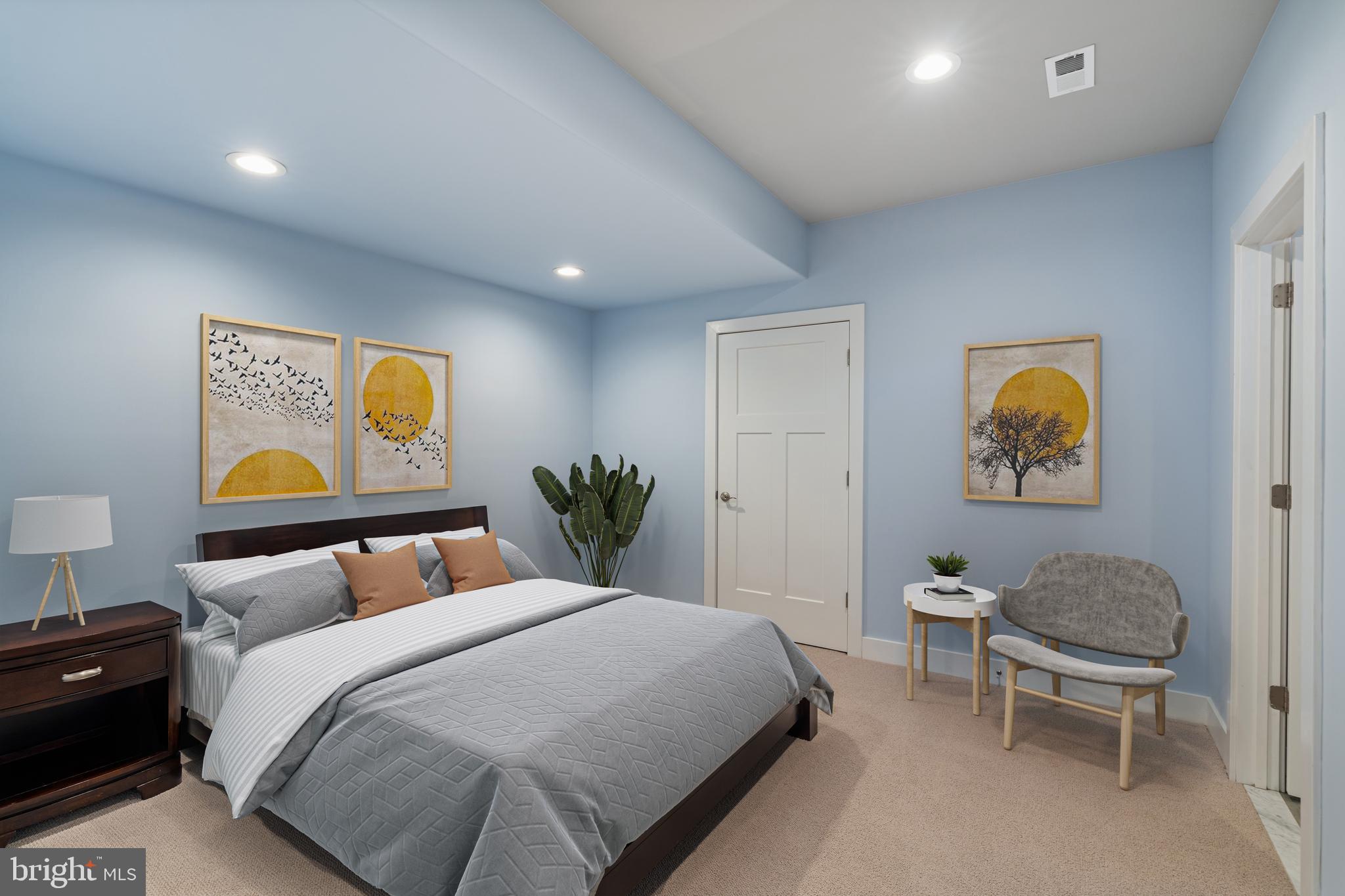 601 Spruce Lane Villanova, PA 19085 - Photo 23 of 27 a bedroom with a bed and painting on the wall