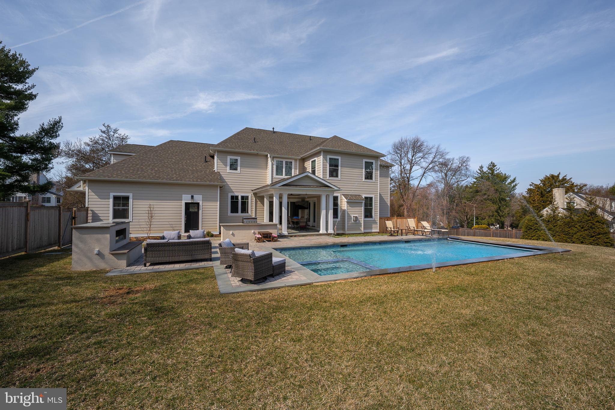 601 Spruce Lane Villanova, PA 19085 - Photo 25 of 27 a view of a house with swimming pool and sitting area