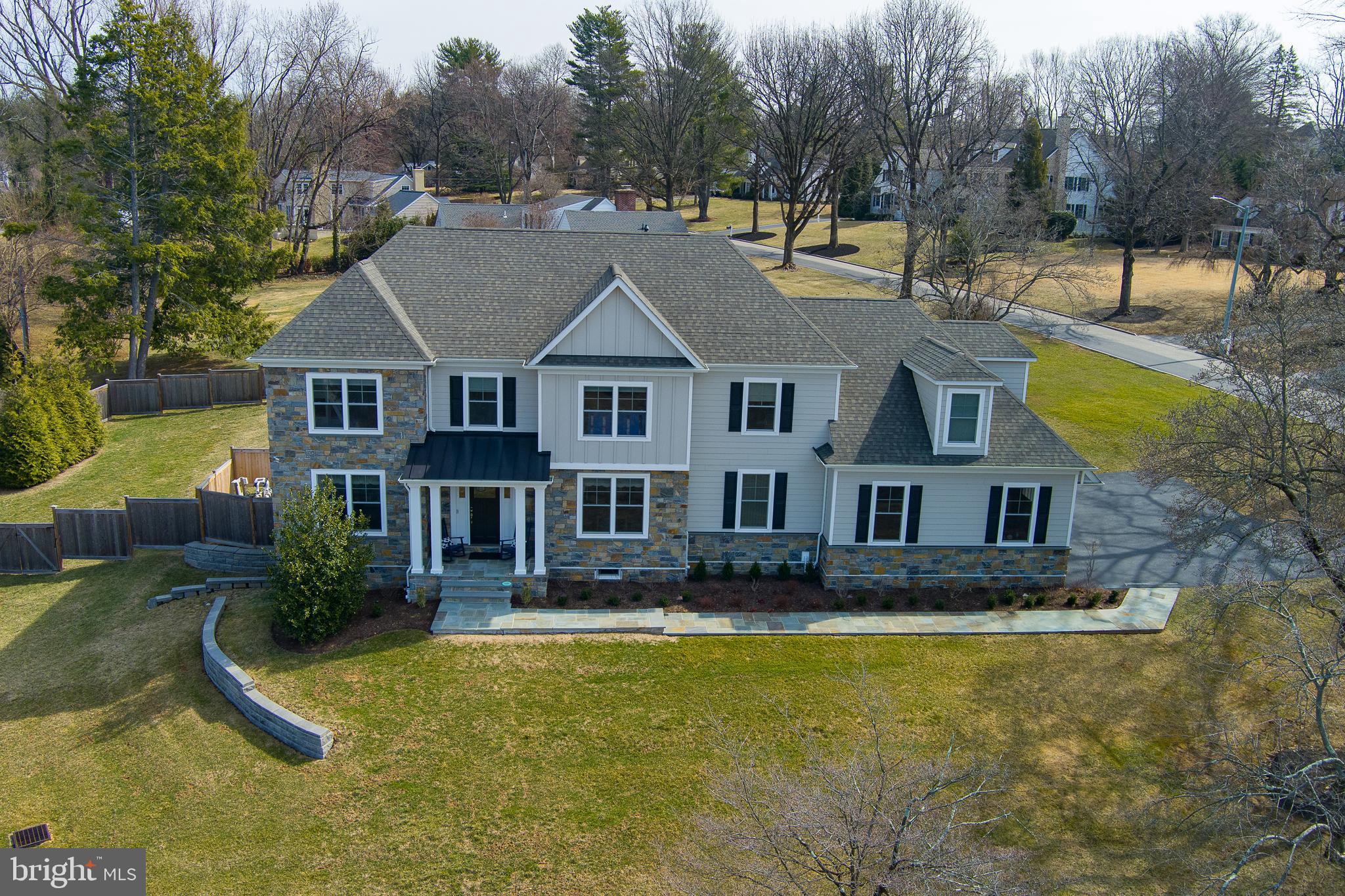 601 Spruce Lane Villanova, PA 19085 - Photo 27 of 27 a front view of a house with swimming pool and porch