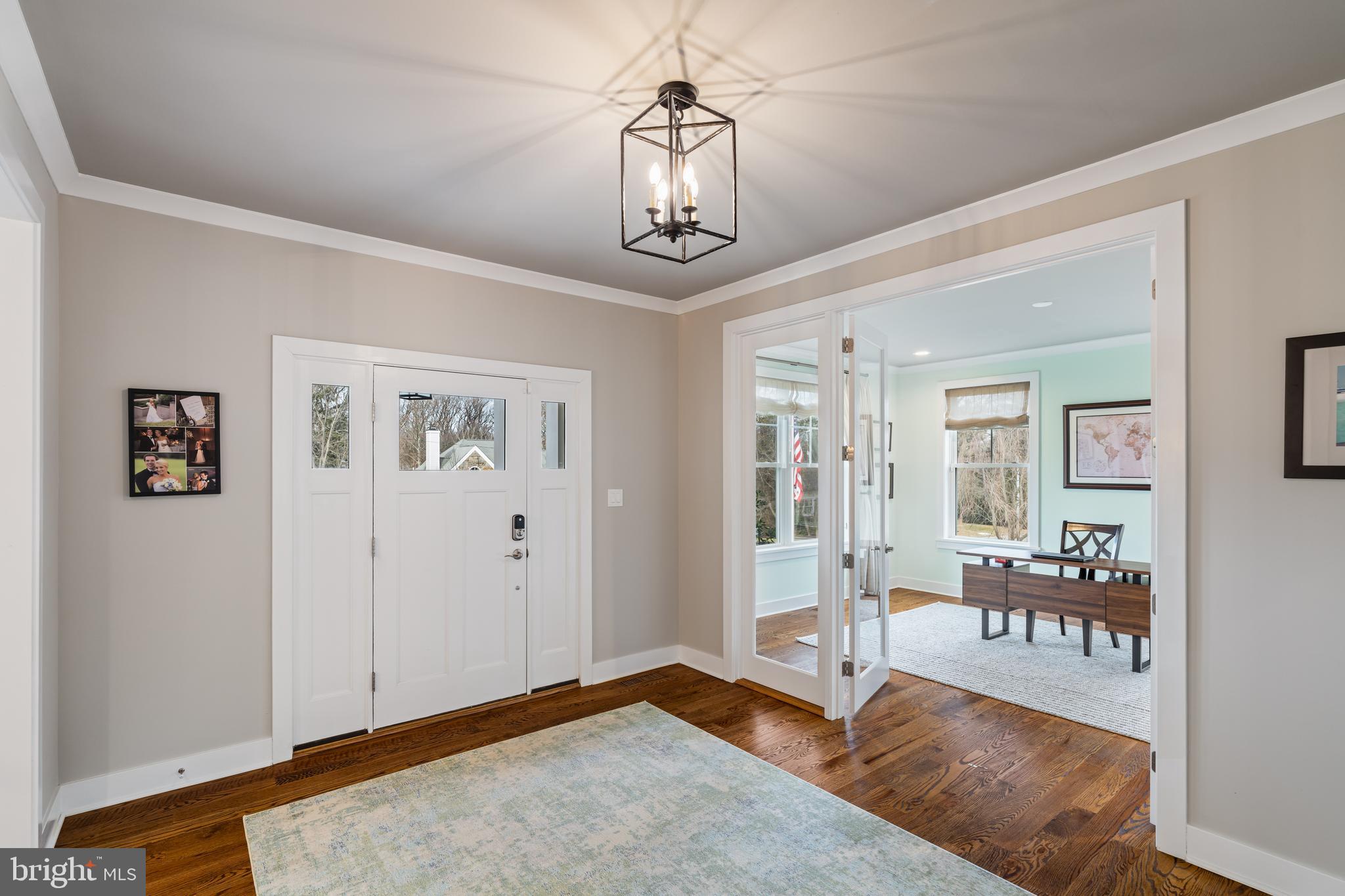 601 Spruce Lane Villanova, PA 19085 - Photo 3 of 27 a view of a livingroom with wooden floor and windows