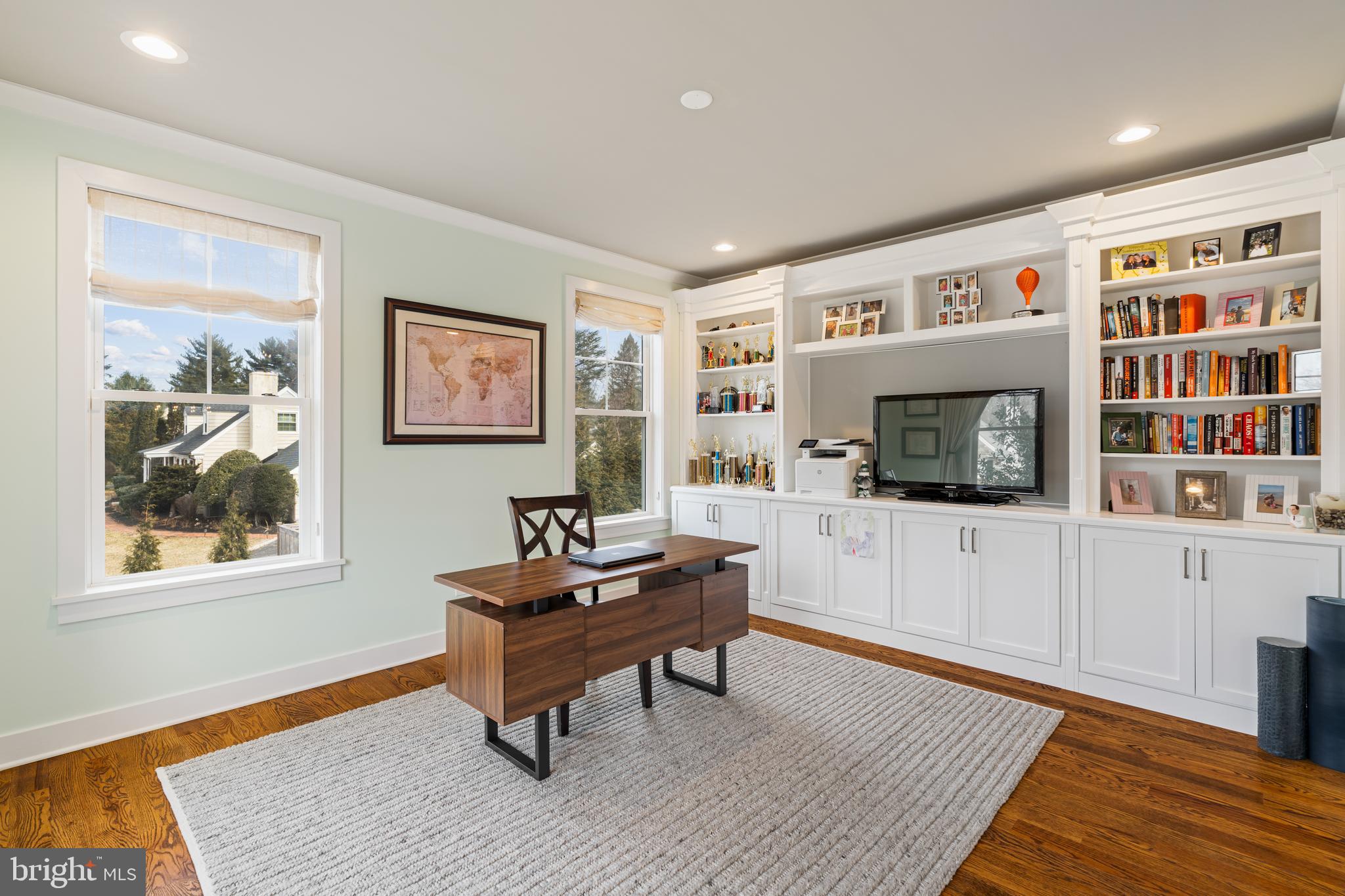 601 Spruce Lane Villanova, PA 19085 - Photo 6 of 27 a living room with furniture and a flat screen tv