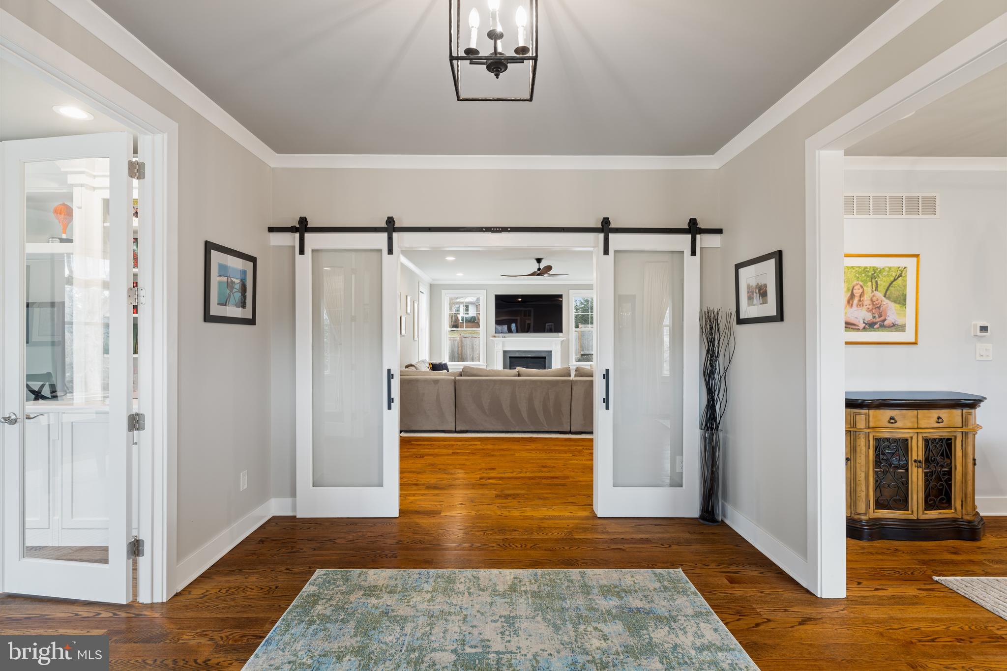601 Spruce Lane Villanova, PA 19085 - Photo 7 of 27 a view of a hallway with wooden floor