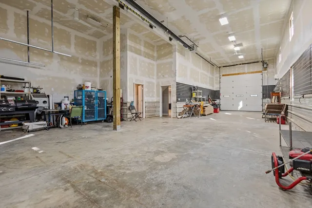 a view of a livingroom with stairs