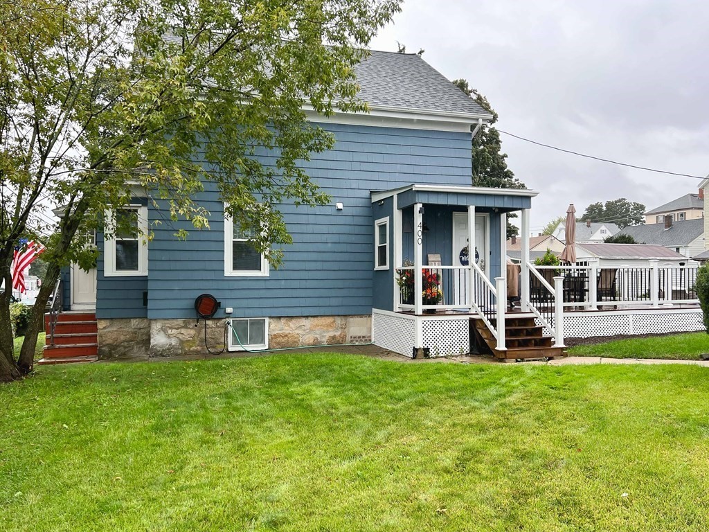 400 Anthony Street Fall River, MA 02721 - Photo 2 of 32 a house view with a sitting space and garden