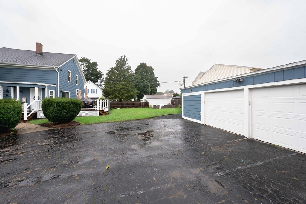 400 Anthony Street Fall River, MA 02721 - Photo 28 of 32 a front view of house with yard