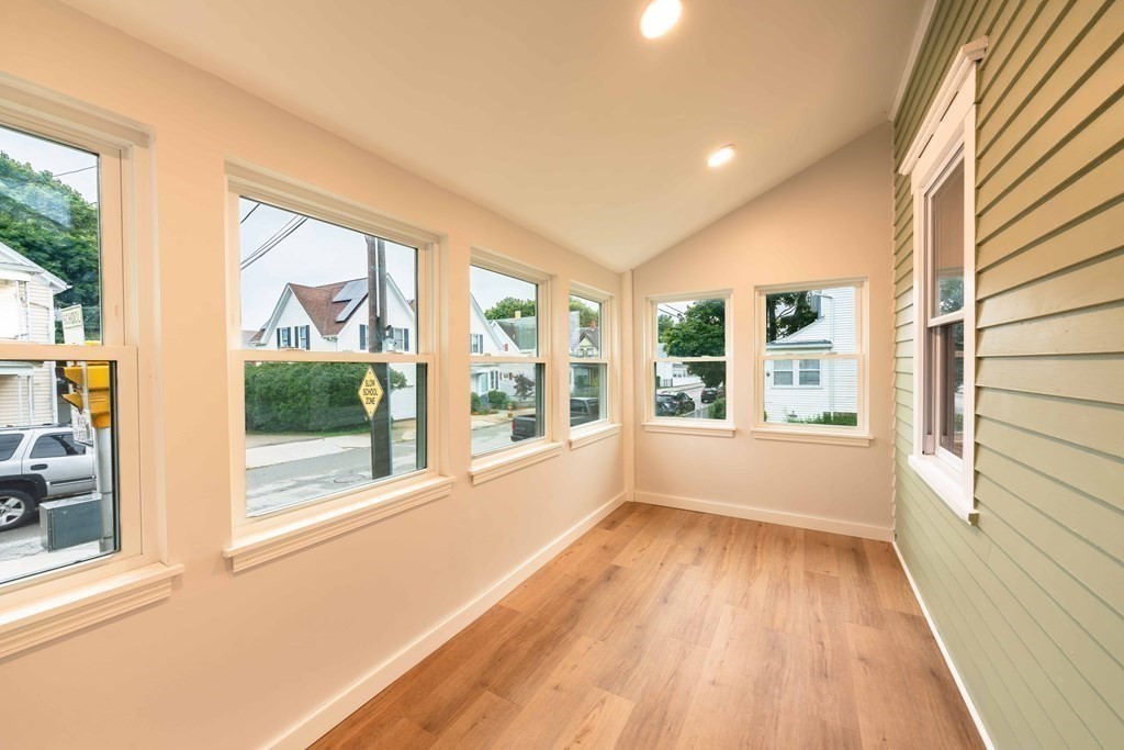 400 Anthony Street Fall River, MA 02721 - Photo 5 of 32 a view of an empty room with wooden floor and a window