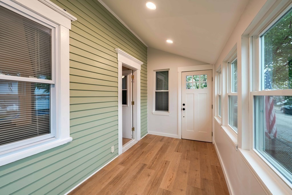 400 Anthony Street Fall River, MA 02721 - Photo 7 of 32 a view of a house with wooden floor and a window