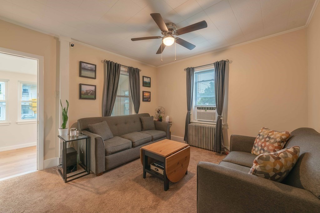 400 Anthony Street Fall River, MA 02721 - Photo 8 of 32 a living room with furniture and a window