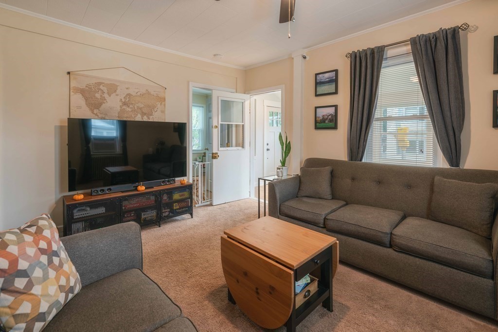 400 Anthony Street Fall River, MA 02721 - Photo 9 of 32 a living room with furniture and a flat screen tv