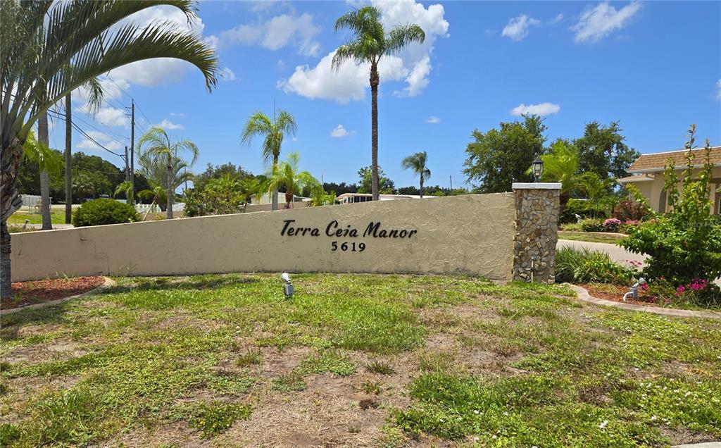 5619 Bayshore Road, Unit 435 Palmetto, FL 34221 - Photo 45 of 56 a view of outdoor space with garden