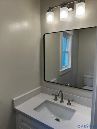 a bathroom with a sink and a toilet
