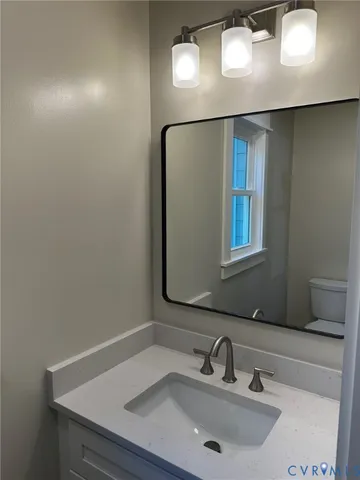 a bathroom with a sink and a toilet