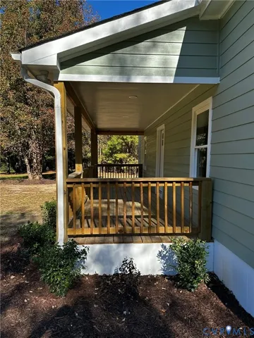 a view of fountain in front of a house