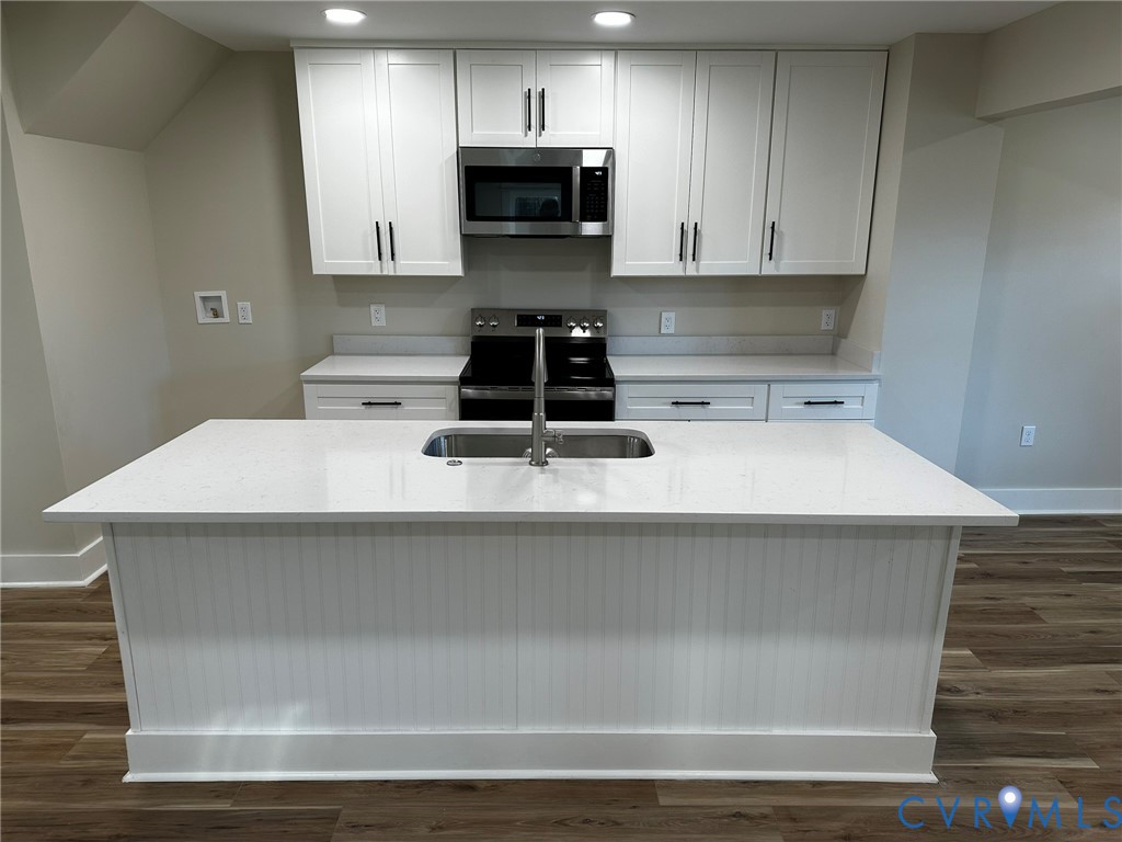 595 Liberty Road Alberta, VA 23821 - Photo 9 of 24 a kitchen with a stove and a microwave
