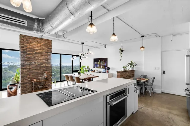 a view of a living room with furniture