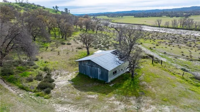 a view of a wooden deck and a lake view