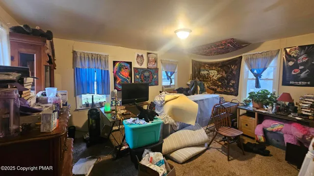 a living room filled with furniture and a couch