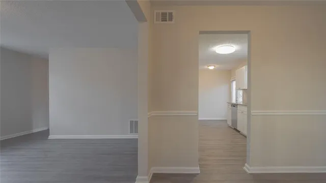 a bathroom with a granite countertop sink and vanity