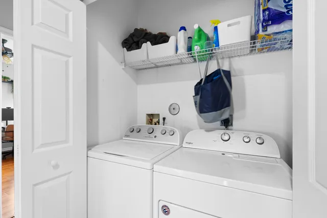 a utility room with dryer and washer