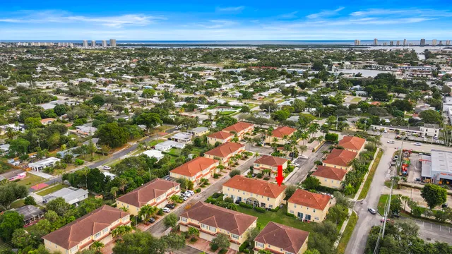 an aerial view of residential building with parking space