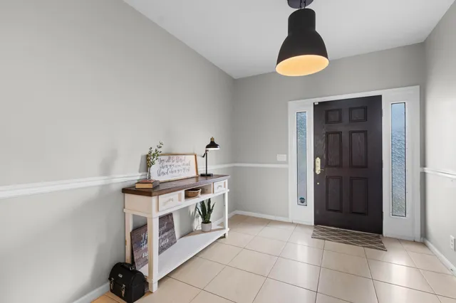 a kitchen with a stove and a cabinets