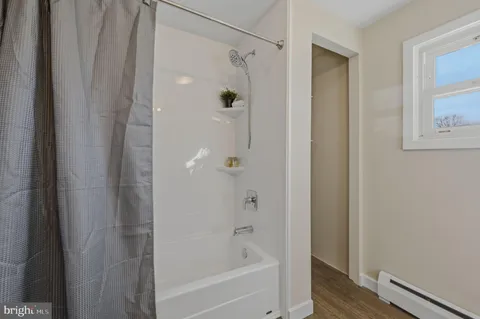 a bathroom with a bathtub