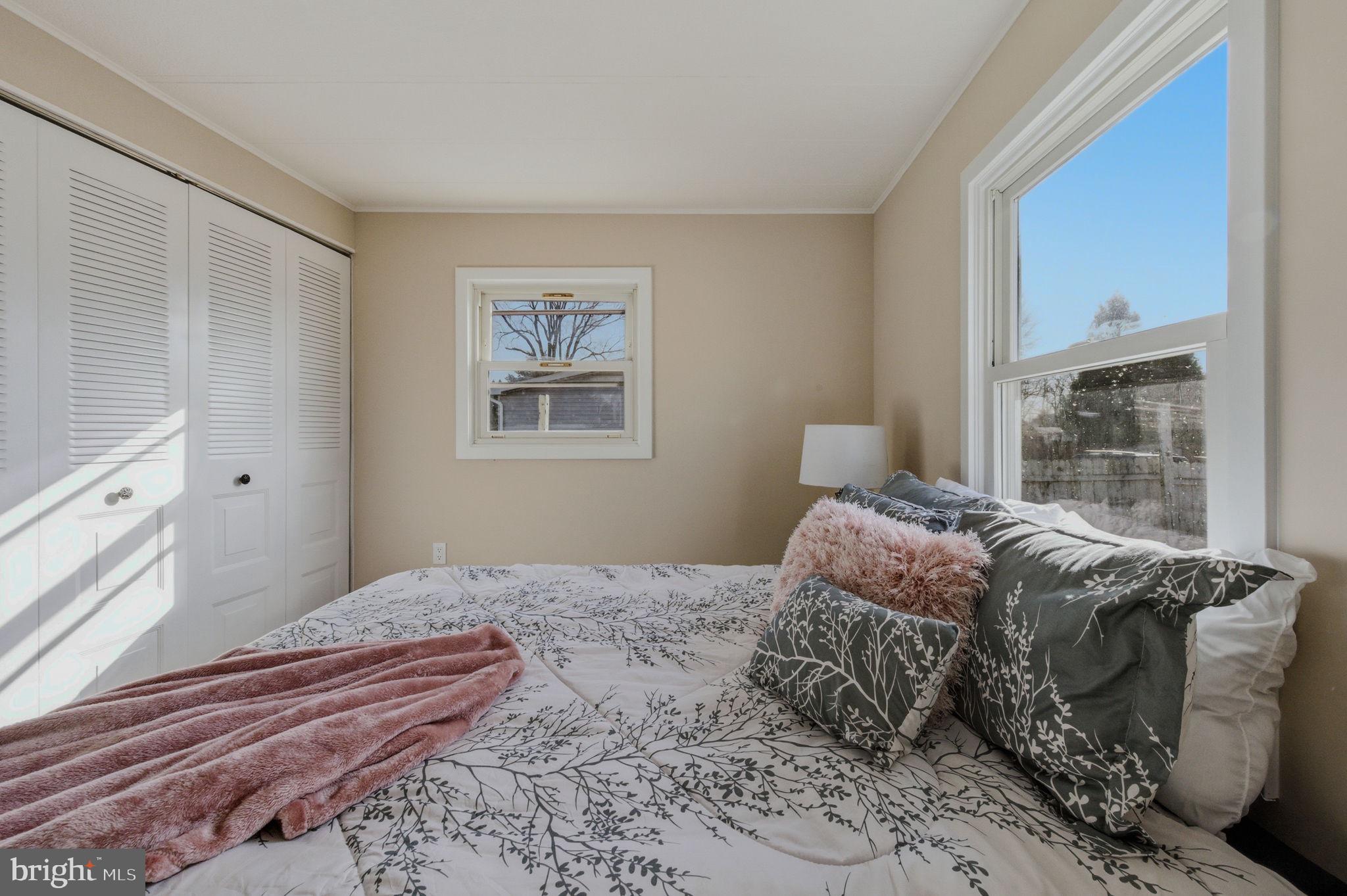 946 Vandyke Greenspring Road Townsend, DE 19734 - Photo 20 of 32 a bedroom with a large bed and a window