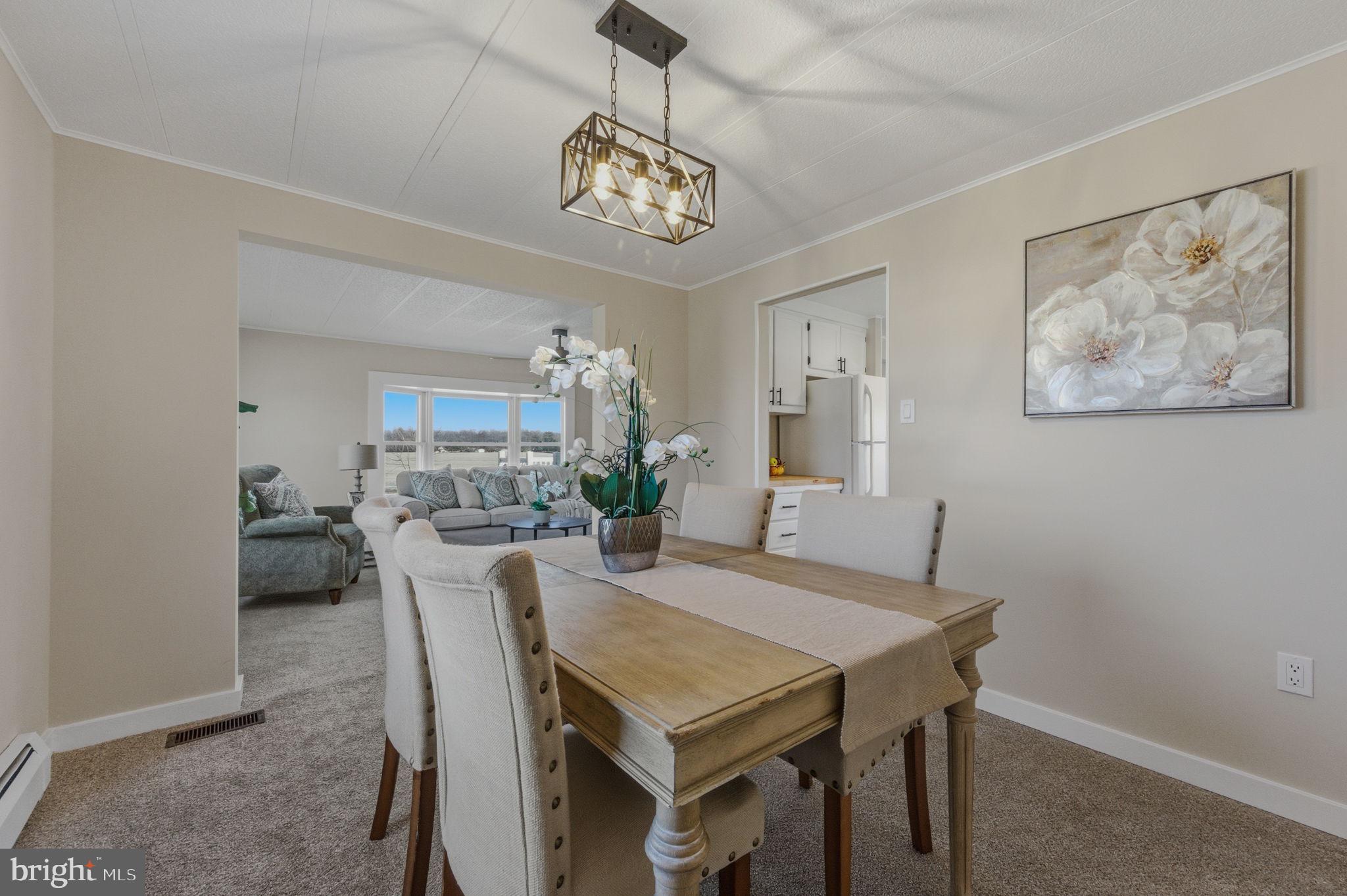 946 Vandyke Greenspring Road Townsend, DE 19734 - Photo 8 of 32 a view of a dining room with furniture