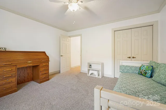 a bathroom with a sink toilet vanity and shower
