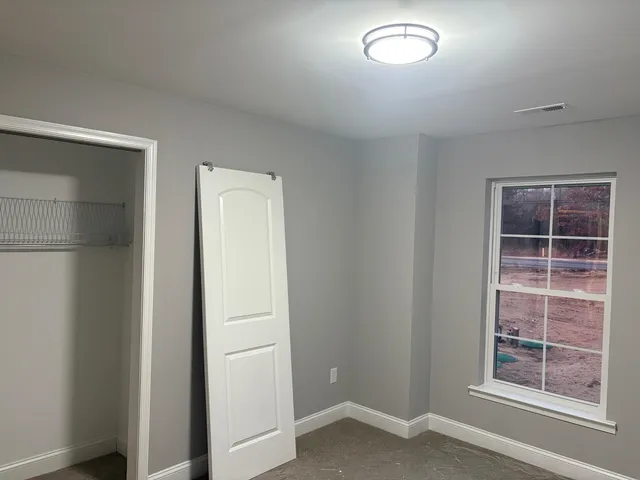 an empty room with closet