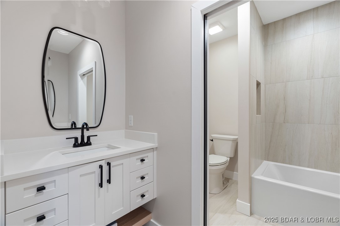 439 Red Bud Road Lake Ozark, MO 65049 - Photo 29 of 42 Second floor guest full bath